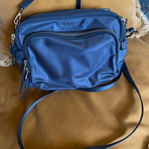Tumi crossbody purse